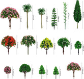 Assorted miniature artificial trees for train scenery and diorama models, ideal for DIY crafts and landscape building.