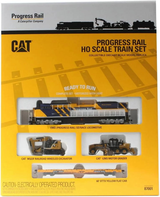 HO scale Caterpillar Progress Rail train set with diecast model construction trucks and equipment, 1:87 scale, Model 87001.