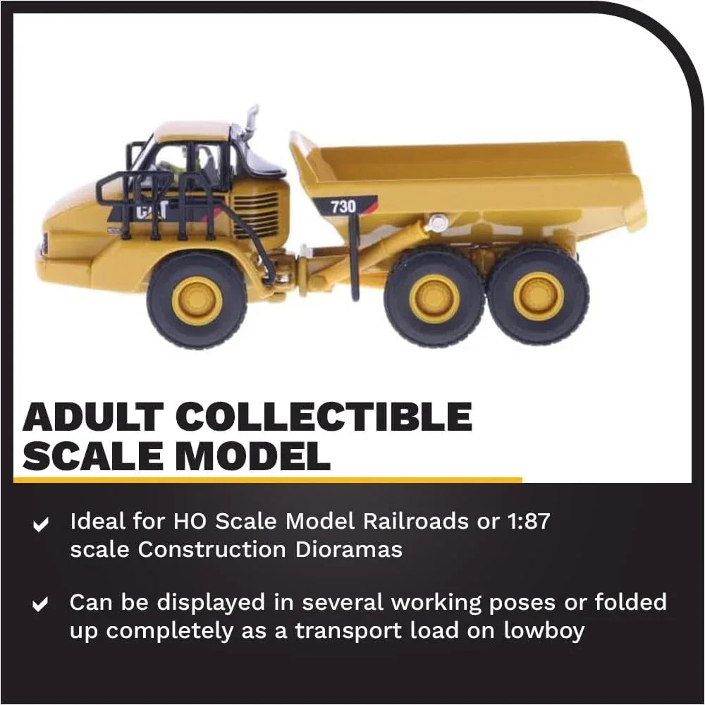 Diecast Masters Caterpillar 730 Articulated Truck HO scale diecast model showing detailed construction vehicle in gray color.