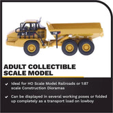 Diecast Masters Caterpillar 730 Articulated Truck HO scale diecast model showing detailed construction vehicle in gray color.