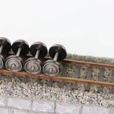 Set of 24 HO scale 1:87 metal model train wheels with 33-inch diameter, compatible with DC model train layouts.