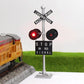 Evemodel HO scale railroad crossing sign set with flashing red LED train signals and circuit board flasher for model train layouts.