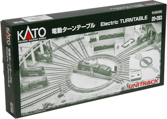Kato N scale electric model train turntable with detailed circular track and control mechanism for model railroading.