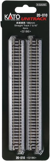 Set of four Kato USA N Scale Unitrack 7.5-inch straight model train tracks on a flat surface.