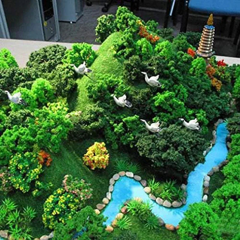36-piece MOMOONNON model tree set with natural green foliage, ranging from 1.36 to 6 inches for train scenery and craft projects