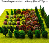 Assorted miniature artificial trees for model train scenery and diorama, featuring 70 tiny trees in various styles by MOMOONNON.