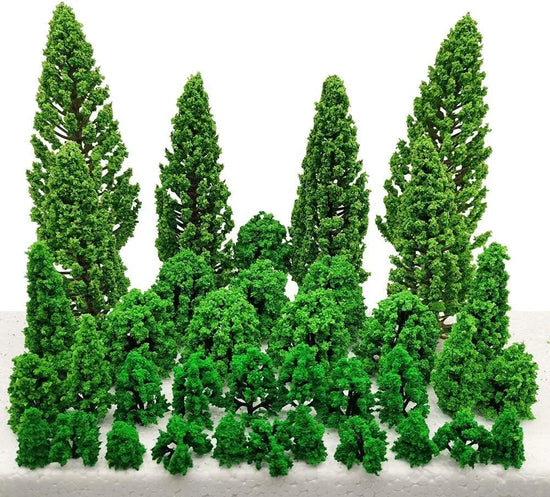 Assorted miniature trees and bushes set for dioramas and scenic train landscapes, featuring 40 detailed model greenery pieces.