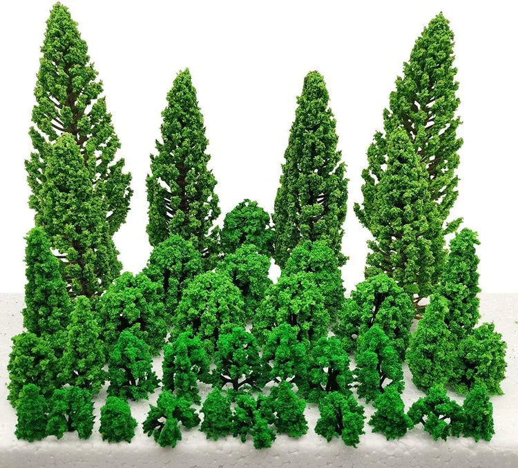 Assorted miniature trees and bushes set for dioramas and scenic train landscapes, featuring 40 detailed model greenery pieces.