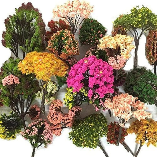 Set of 32 vibrant colored model trees from NW, ideal for train scenery and architectural landscape displays.