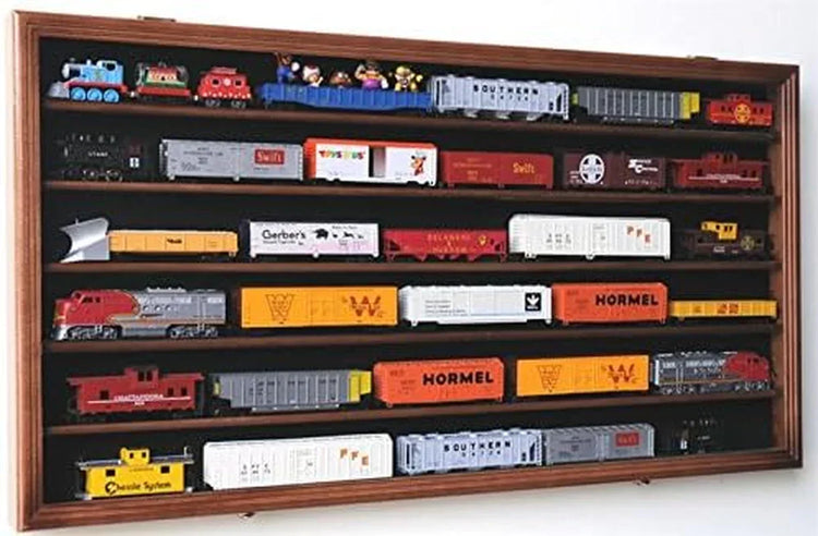 Walnut wall-mounted lockable display cabinet for HO scale model trains with UV protection, showcasing model trains inside.