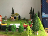 Mixed model plastic trees set with animal figures for HO scale train scenery, including 70 pieces of 1.5-6 inch trees and bushes