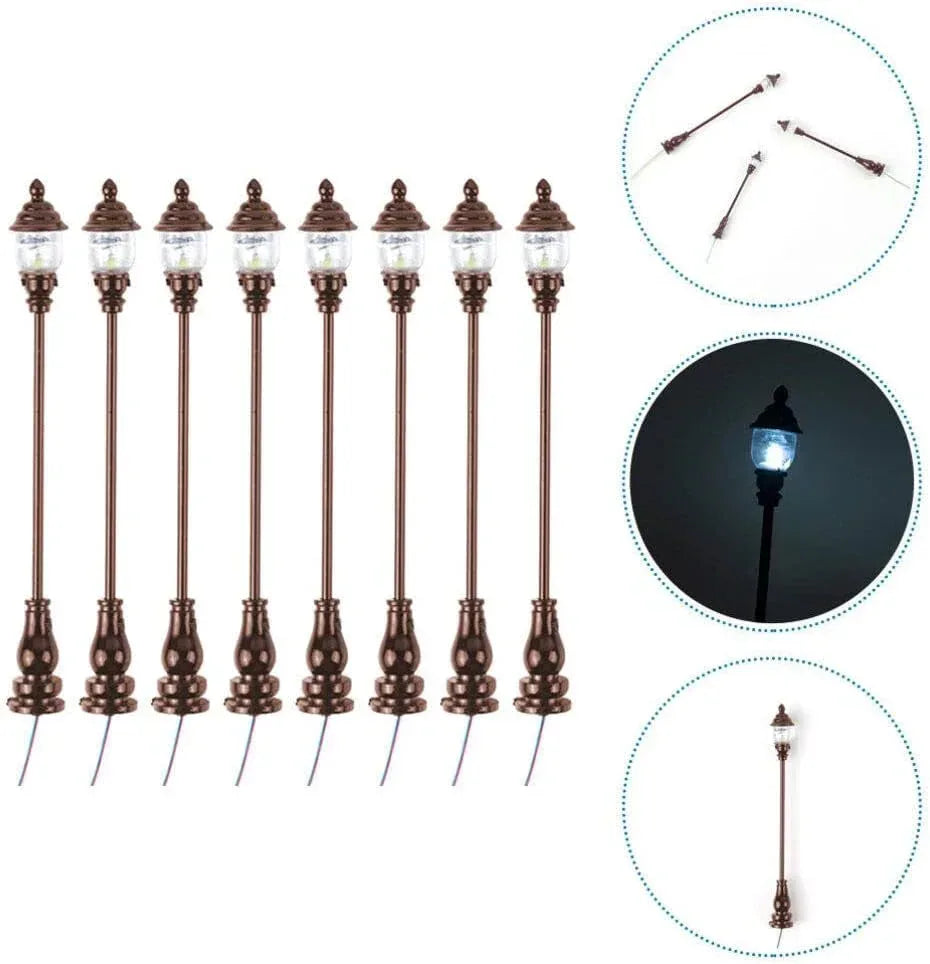 Uonlytech 8-piece miniature garden lighting set with grey decorative lamps for dollhouses, nativity scenes, and model train displays.