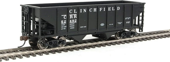 HO scale Walthers Trainline coal hopper model train car with black body and detailed hopper design for model railroads.