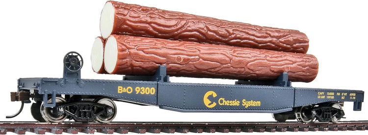 HO Scale Walthers Trainline Red Log Dump Car with realistic logs, suitable for model train layouts and railway scenery.