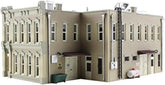 Pre-assembled Woodland Scenics municipal building model for model railroads and dioramas, detailed miniature architecture.