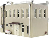 Pre-assembled Woodland Scenics municipal building model for model train layouts and dioramas.