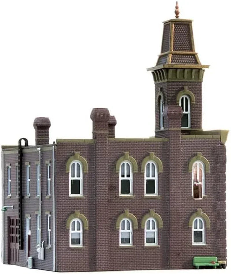 N scale Woodland Scenics pre-assembled firehouse model with detailed fire station building and realistic firetruck display.
