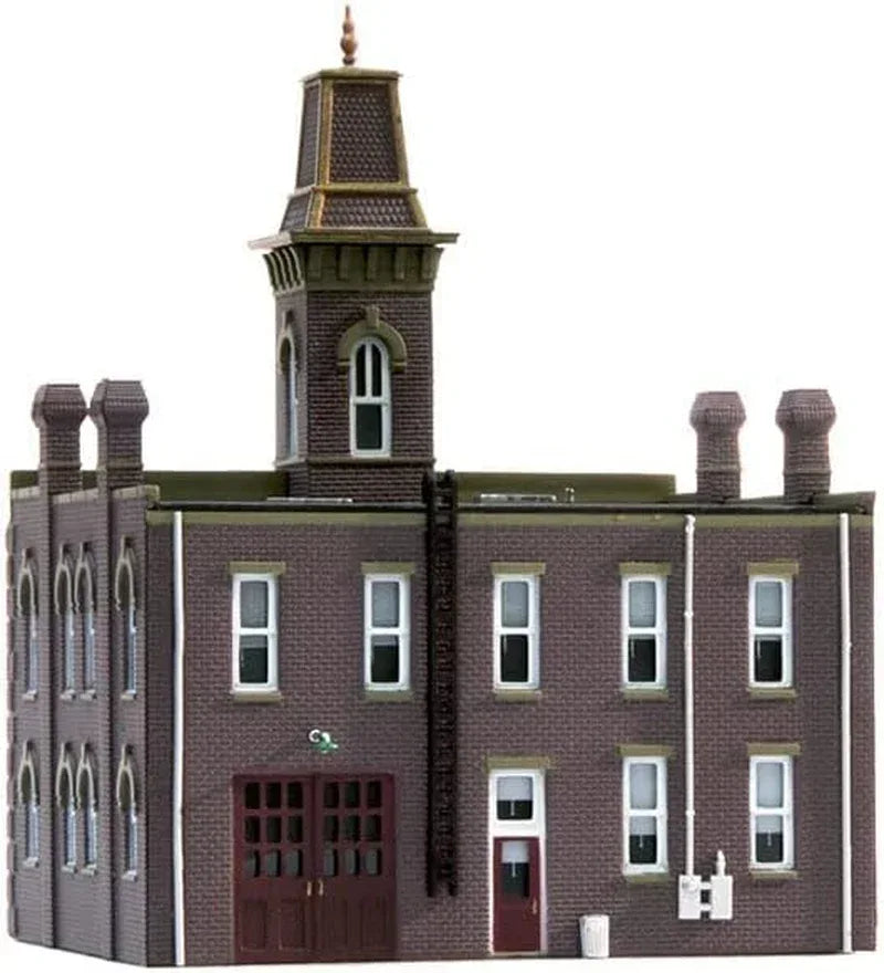 N scale Woodland Scenics pre-assembled firehouse model with detailed fire station building and realistic exterior features.