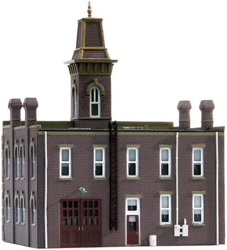 N scale Woodland Scenics pre-assembled firehouse model with detailed fire station building and realistic exterior features.