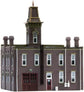 N scale Woodland Scenics pre-assembled firehouse model with detailed fire station building and realistic exterior features.
