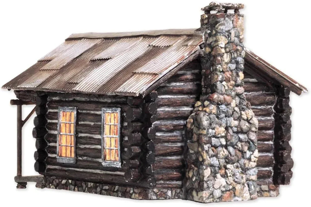 Woodland Scenics BR4961 Cozy Cabin N Scale model kit showing a detailed miniature cabin with trees and scenic landscape.