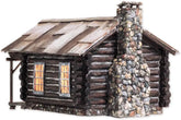 Woodland Scenics BR4961 Cozy Cabin N Scale model kit showing a detailed miniature cabin with trees and scenic landscape.