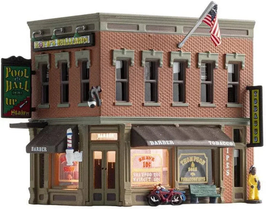 N Scale Corner Emporium model building by Woodland Scenics, detailed miniature storefront for model train layouts.