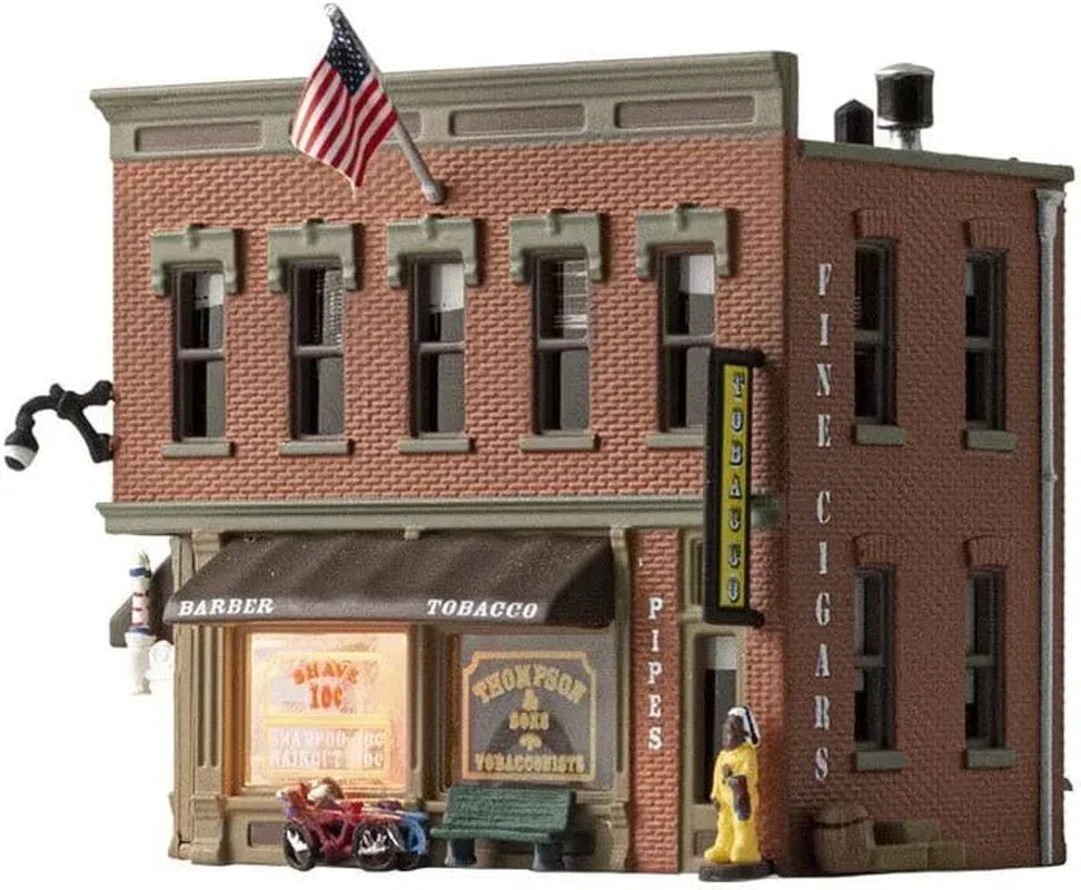 N Scale Corner Emporium model building by Woodland Scenics, detailed miniature storefront for model train layouts.