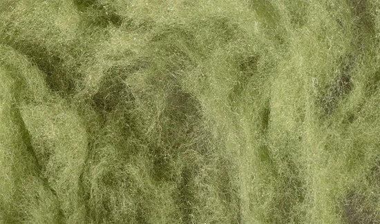 Woodland Scenics 16G green polyfiber material for model scenery, showing fine green fiber strands in a close-up image.