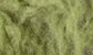 Woodland Scenics 16G green polyfiber material for model scenery, showing fine green fiber strands in a close-up image.